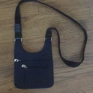 Nine West Navy Crossbody with black strap.